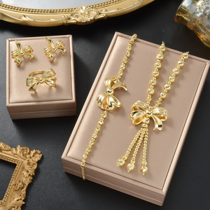 Elegant copper wholesale lustrous bow tassel necklaces <b>bangles</b> pendant earrings fine rings for formal gathering jewelry <b>set</b> - Product Image 1