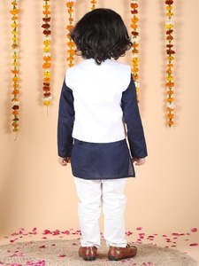 Adorable little <b>boy</b> in navy blue <b>kurta</b> with white waistcoat and pajama festive ethnic outfit front pose smiling child - Product Image 2