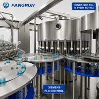 Solution tout-en-un pour le lavage, le rinçage, le remplissage et le bouchage automatiques d'eau potable pure minérale en bouteilles PET et en verre