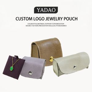 YADAO <span class=keywords><strong>2026</strong></span> Nouvelle pochette à bijoux en cuir de haute qualité avec bouton pour le rangement et l'emballage de bagues et de pendentifs - Product Image 1