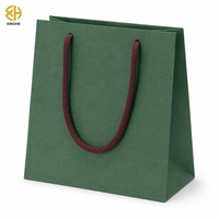 Petit sac cadeau en papier kraft vert foncé avec poignées tressées épaisses pour bougies, huiles essentielles, boîtes de thé, emballages d'artisanat