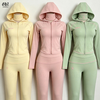 Ensemble streetwear femme automne 2026, logo personnalisé, survêtement rose pour femme, veste à capuche zippée et pantalon évasé, ensemble de sport 2 pièces pour femme