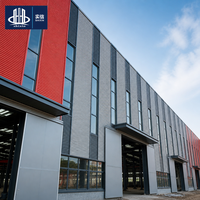 Entrepôt préfabriqué en acier avec panneaux en acier de couleur personnalisée, fabricant de bâtiments d'usine et d'ateliers à structure portique à Chongqing