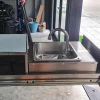 Cuisine extérieure coulissante ECOCALO 4x4 en acier inoxydable avec deux cuisinières, évier, tiroir de rangement et ailes latérales pour Nissan NP300