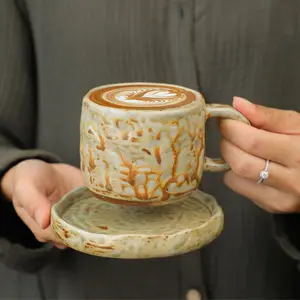 Venta caliente de 270ml en la tienda en línea Retro nuevo esmalte hecho a mano chino cerámica gres taza de café y platillo