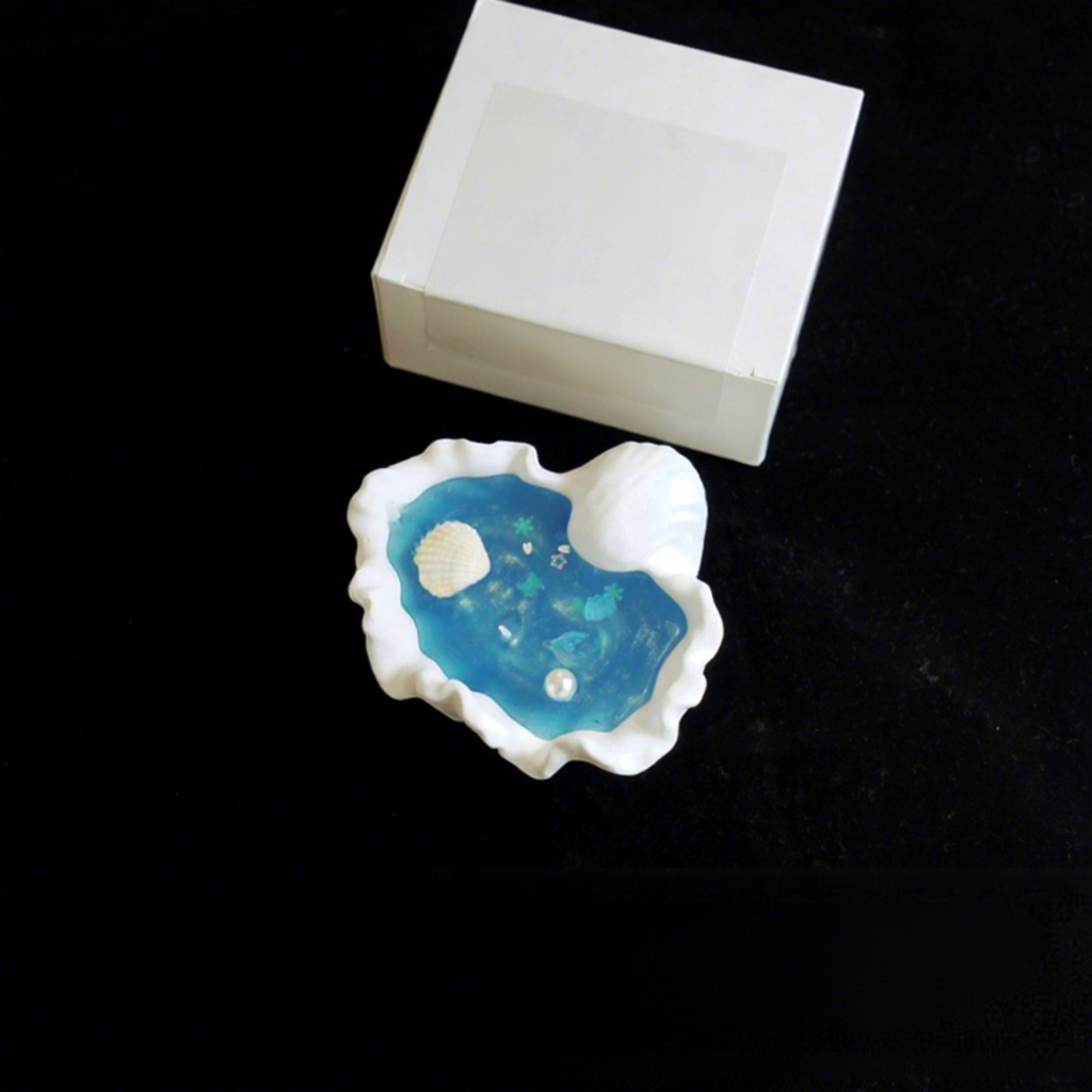Bougie parfumée océan style coquillage bleu