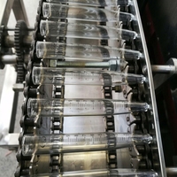 Machine de fabrication de tubes centrifuges en verre (machine de formage de tubes centrifuges en verre) capable de former des tubes centrifuges à partir de tubes en verre