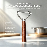 Éplucheur de cuisine manuel en alliage de zinc, lame en acier inoxydable, manche en bois, outil multifonction pour éplucher les légumes et les fruits, passe au lave-vaisselle