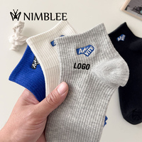 OEM Vente en gros Automne Hiver Coton désodorisé Haute qualité Hommes Couple Sports Mode Chaussettes brodées