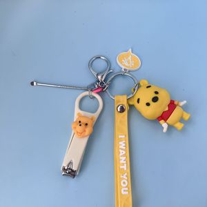 Llavero de Dinosaurio de Dibujos Animados con Limpiador de Oídos y Cortaúñas, Bonito Colgante de Muñeco para Bolsa, Llavero Universal para Niños - Product Image 5