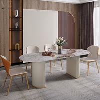 Mobilier moderne de luxe de style italien haut de gamme Base en cuir minimaliste blanc Table à manger ovale à dessus en marbre 8 places