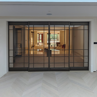 Porte battante intérieure exclusive en verre trempé transparent noir mat, design exclusif, pour bureaux et hôtels haut de gamme
