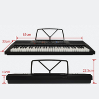 Soporte de teclado de piano portátil electrónico de 61 teclas al por mayor, sintetizador Digital para niños, enseñanza para principiantes, hecho de plástico duradero