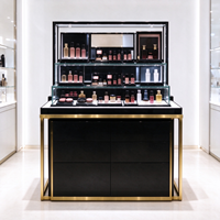 Présentoir à parfums noir et or en verre, comptoir îlot, étagères murales, boîte à lumière, affiche CE ETL pour magasin de beauté