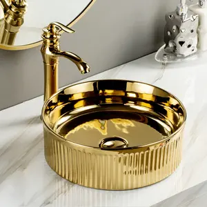 Lavabo ovale doré lavabo comptoir de luxe évier de salle de bain éviers d'art