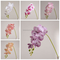 Vente en gros de fleurs d'orchidées artificielles à 7 têtes, effet réaliste, tige de fleur de phalaenopsis artificielle, pour la décoration de mariage, de la maison et d'événements