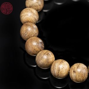 Pulsera Minimalista de Madera de Oud Malayo con Cuentas Redondas de 10 mm y Superficie Lisa, Joyería Elegante - Product Image 4