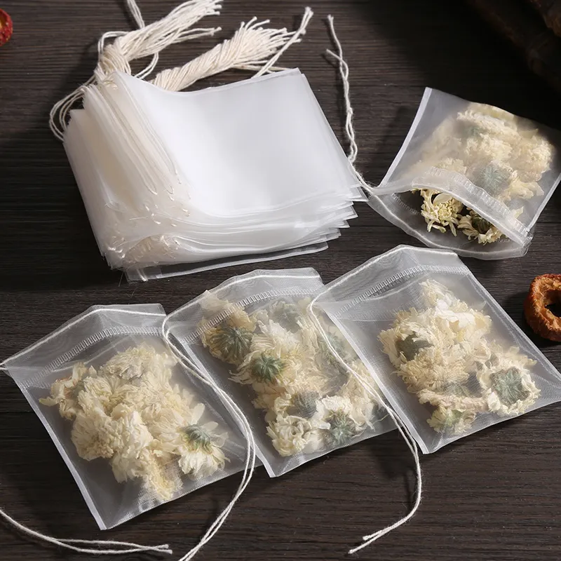Bolsa de té de nailon reutilizable de tela no tejida biodegradable con logotipo, bolsa piramidal de filtro de té con cordón, bolsa de té vacía personalizada