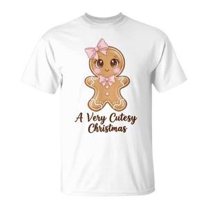 Un t-shirt rose à nœud papillon en forme de pain d'épices de Noël très mignon - Product Image 1
