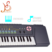 Piano Electrónico HUASHENG de 37 Teclas, Plástico, con Altavoz Integrado, 8 Timbres, 8 Ritmos, 4 Percusiones, Control de Volumen y Tempo