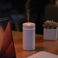 Flamme Coloré Atmosphère Lumière Parfum Électronique Logo Monté Huile Essentielle Mini Noir Diffuseur D'air De Voiture Humidificateur