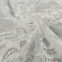 Tissu de dentelle en nylon blanc 100% respirant et écologique tricoté léger pour robes de mariée élégantes et projets décoratifs