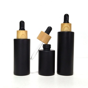Empty Flat Shoulder Luxury Cosmetic Packaging 20ml 30ml 50ml 100ml Frosted Black Glass Eye <b>Drop</b> Serum Dropper Bottle Plastic Lid - Product Image 2