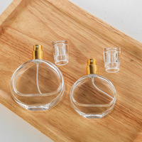 Flacon de parfum élégant, forme plate et ronde, flacon en verre pour parfum avec bouchon transparent de luxe, flacon pulvérisateur de parfum en verre de 100 ml