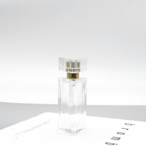 Venta al por Mayor de Botellas de Perfume de Vidrio Blanco Cristal de 50 ml, Botellas de Repuesto Cosméticas Triangulares de 30 ml con Pulverizador y Tapas a Presión - Product Image 5