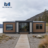 Maison conteneur préfabriquée mobile modulaire démontable de luxe au design artisanal moderne, extensible, à double aile et mur en verre, compacte