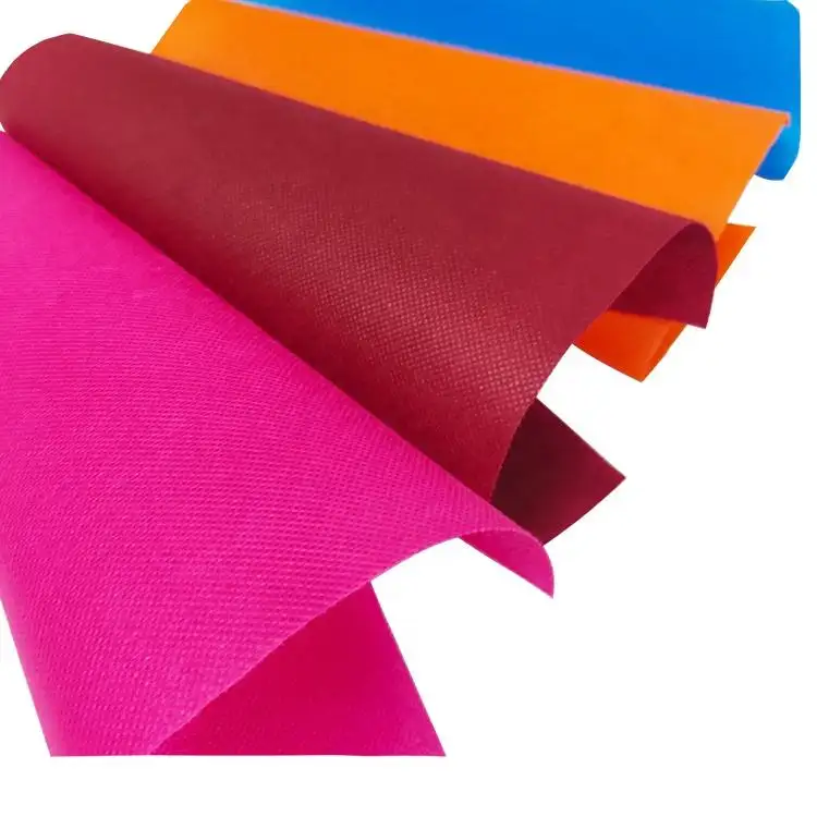 Vente d'usine tissu non tissé tissu non tissé en rouleau 100% polypropylène filé collé rouleau de tissu non tissé