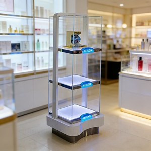 Vitrine de présentation au sol en verre avec cadre en métal moderne pour cosmétiques avec éclairage LED, présentoir professionnel pour parfums et soins de la peau - Product Image 1