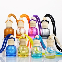 Vente en gros de flacons de parfum pour voiture en verre noir de 10 ml, diffuseur d'arômes suspendu pour voiture