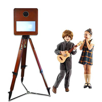 Machine interactive de cabine photo de selfie d'écran tactile de miroir magique de cabine photo populaire traditionnelle