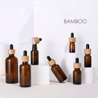 Bouteilles d'huile essentielle en verre ambré rond écologiques vides de 5 ml à 100 ml avec bouchon compte-gouttes en bambou, échantillons gratuits, MOQ 50