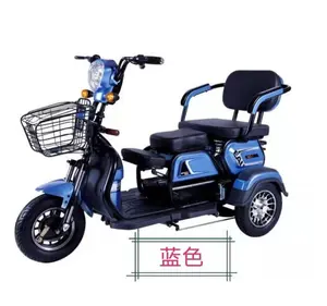A small electric tricycle is used as a recreational scooter for walking