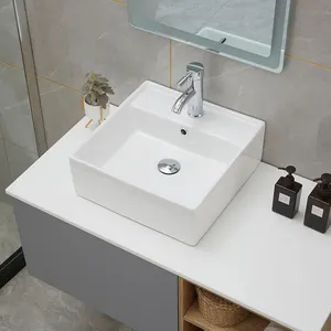 Lavabo en céramique de restaurant d'hôtel de porcelaine simple blanche Lavabo de salle de bains de vanité Lavabos de salle de bains