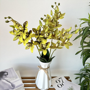 Fleurs artificielles Queyiyi en caoutchouc souple, orchidée tigre à 9 têtes, décoration de mariage, arrangement floral - Product Image 1