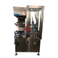 Machine de sécurité automatique pour ligne de production de sprays aérosols, entraînement pneumatique pour applications cosmétiques, huile, gaz, haute efficacité, usine