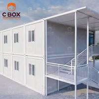 Cbox Maison préfabriquée à deux étages personnalisée, mur-rideau en verre, bâtiment de bureaux, dortoir pour le personnel avec cuisine, maison conteneur en kit