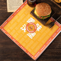 Papier d'emballage pour hamburgers écologique et résistant à la graisse, personnalisable avec logo, idéal pour les boulangeries, restaurants et emballages à emporter pour la restauration rapide.