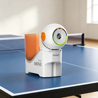Dora Mini Machine de service de tennis de table portable intelligente avec contrôle par application, robot d'entraînement de ping-pong pour la pratique individuelle en intérieur