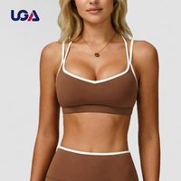 Ensemble de yoga rayé avec haut de sport personnalisé à dos croisé, design color block contrastant, leggings de sport et soutien-gorge