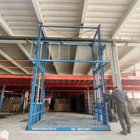 Monte-charge vertical hydraulique industriel personnalisé à commande électrique à distance en acier haute résistance pour entrepôt