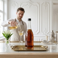 Bouteille de whisky en verre à succès, vente en gros et OEM, bouteille transparente premium à nervures verticales 700ml 750ml pour spiritueux
