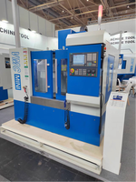 Centre d'usinage vertical CNC avec lubrification et refroidissement automatiques, stabilité accrue pour la fabrication de moules et les moules en aluminium VMC Mini