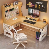 Bureau de jeu en forme de L avec étagère de rangement perforée pour poste de travail informatique à domicile