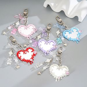 Mini porte-clés cœur en acrylique tressé avec nœud en strass et breloque de sac perlée, pendentif miroir de maquillage portable DIY, esthétique douce - Product Image 1