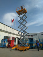 Plateforme élévatrice mobile à ciseaux à prix d'usine pour le levage vertical de marchandises en intérieur et en extérieur