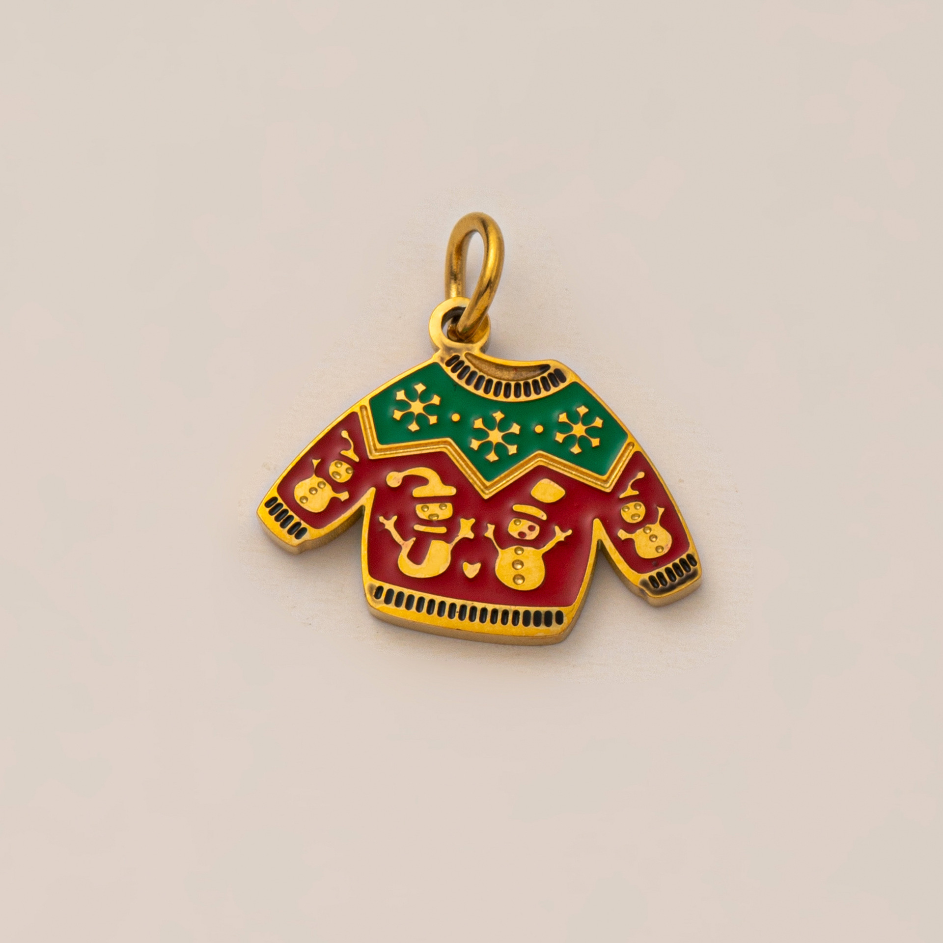 Pendentif pull de Noël doré